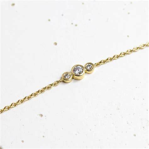 bracelet trilogie diamants infographie